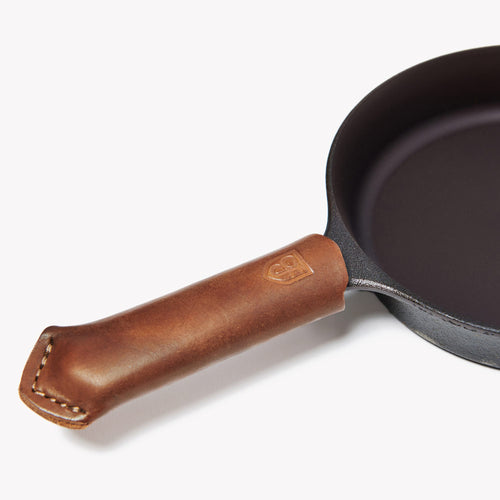 Brown vegetable tanned leather pot handle cover for lodge cast